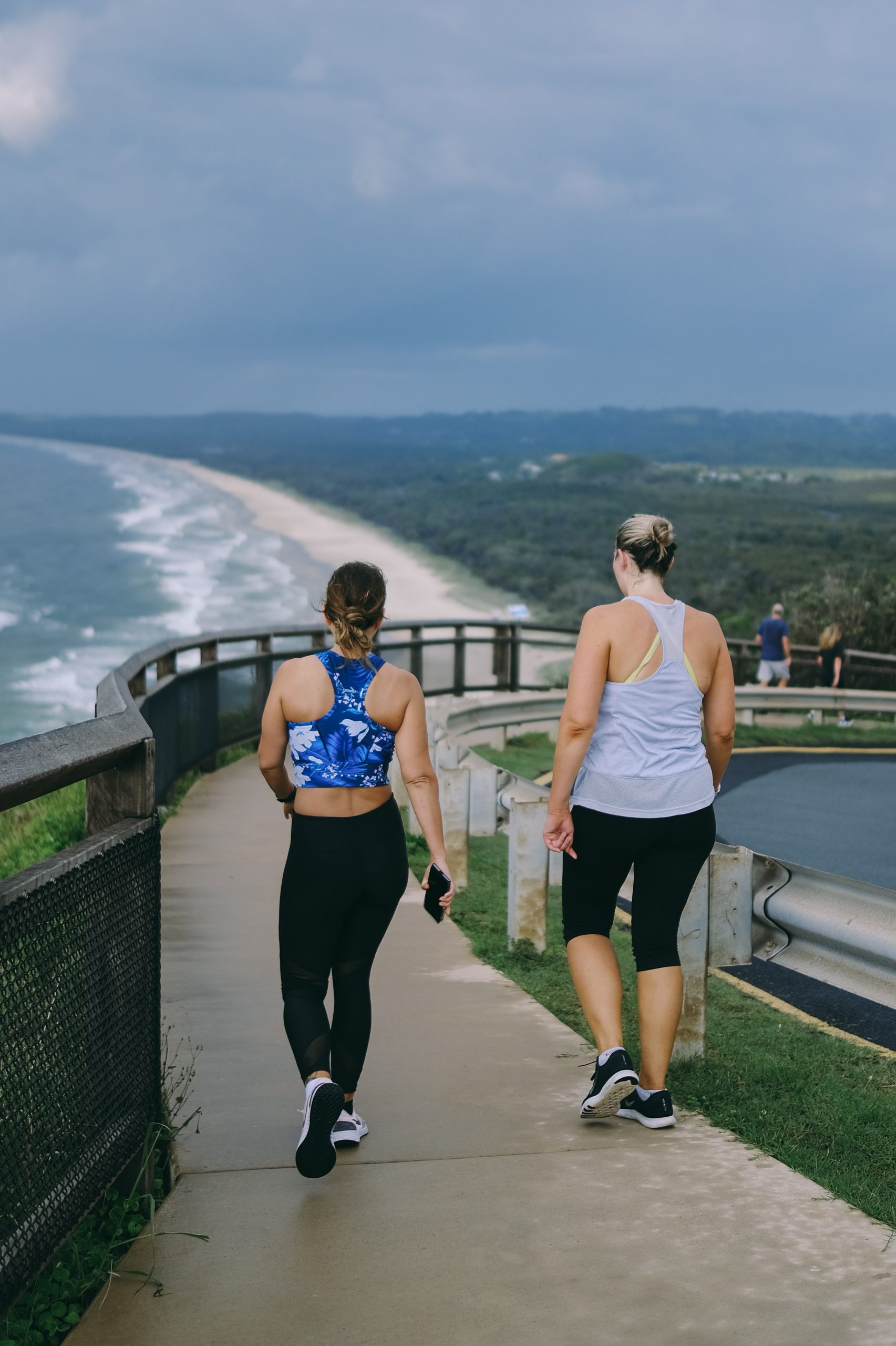 Lifestyle photo social media ad for an NMN supplement brand, showing people staying active